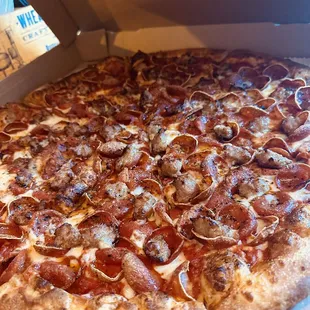The Propa-Pie with sausage added.  (NY Style)