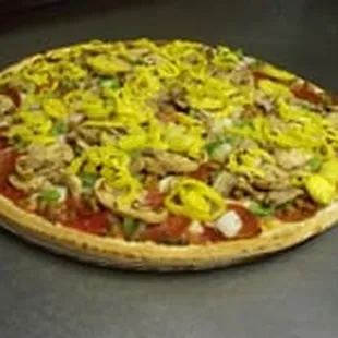 a pizza covered in cheese and toppings