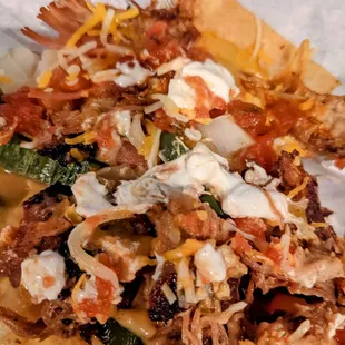 Pork nachos, half size.