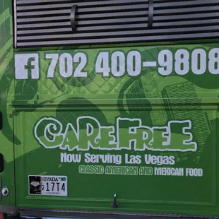 the back of a green bus