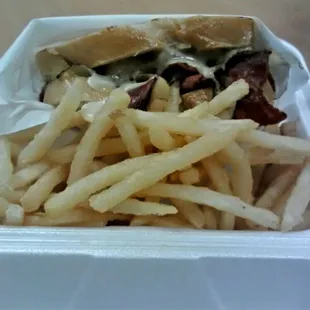 Pastrami sandwich and fries