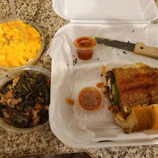 Catfish with mac n cheese and greens. The plate came with fries. I ate them