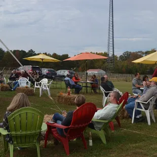 Enjoying a warm October afternoon with a glass of Caret Cellars wine