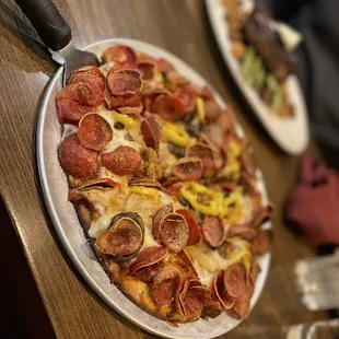 The House medium pizza