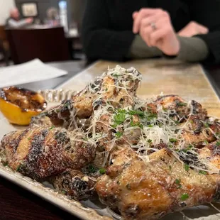 The grilled lemony wings.