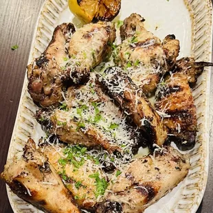 a plate of grilled chicken
