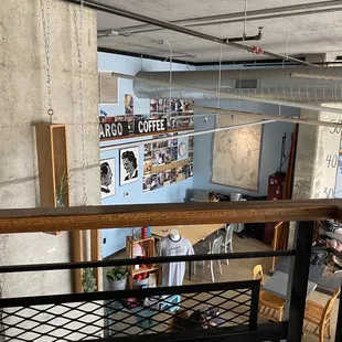 a view of a coffee shop from the second floor