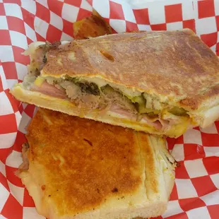This is the Cuban sandwhich. The flavor is unbelievably amazing  that after the first bite i had to take a picture. Try it!!!