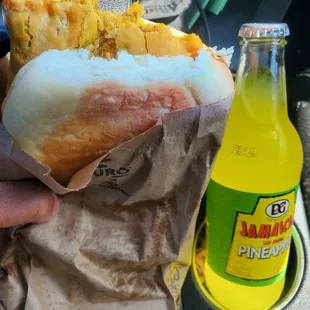 Patty with coco bread and pineapple soda