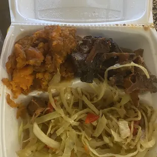 $23 oxtails platter. Should have been named yams and cabbage platter.