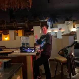a man sitting at a bar