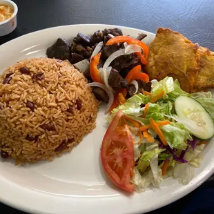 Fried Goat Fried plantains Red Rice and Beans