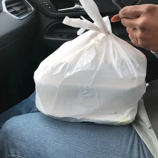 a bag of food in a car