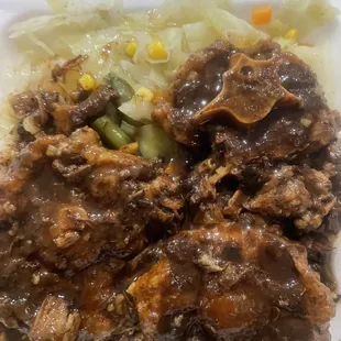 The oxtail with rice and vegetables is so good