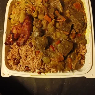 Curry goat platter