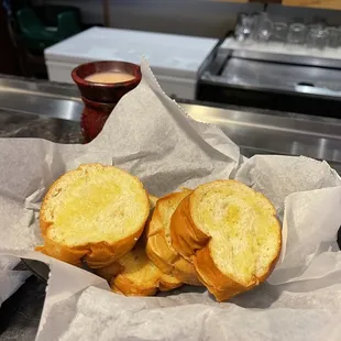 a sandwich in a basket on a counter