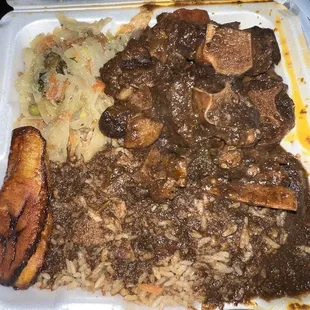 a meal in a styrofoam container