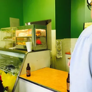 Counter, small place, friendly patrons.