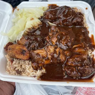 Stew chicken with oxtail sauce