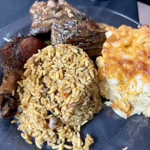 Jerk Chicken, Rice and Peas, Mac and Cheese ($15)