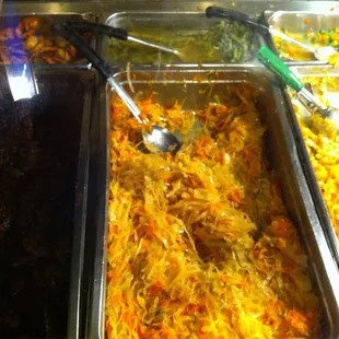 Yams, shredded cabbage, Mac n cheese, fried plantains