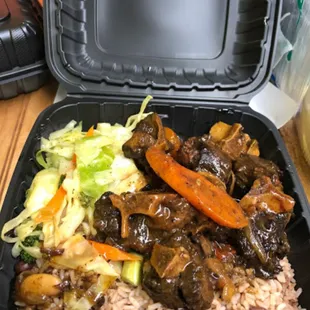 a meal in a styrofoam container