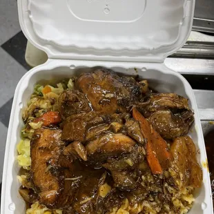 Brown Stew Chicken w reggae rice and cabbage