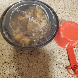 1 cup measuring cup for reference. Cut up chunks of chicken. This equals maybe 1 and a half piece for $14.