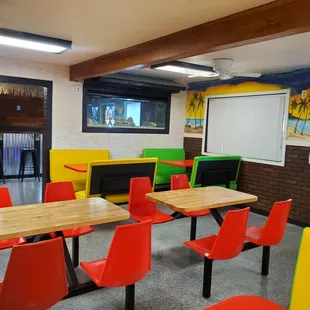 brightly colored tables and chairs