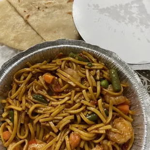 Spicy  shrimp  and Lo Mein. It's good but really spicy!