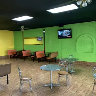 Seating area with TVs.