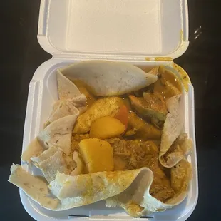 curry chicken in roti to go- I didn't like that it was onto, it made it messy and couldn't eat with sauce
