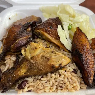 a styrofoam plate of food