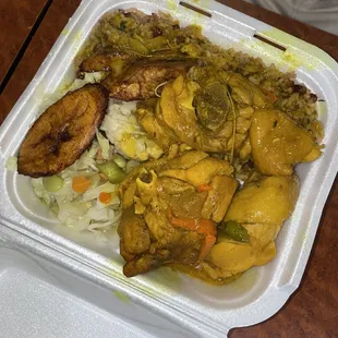 Curry Chicken, cabbage, rice &amp; peas, and plantains.