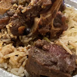 Small Oxtail Meal with cabbage, rice and peas