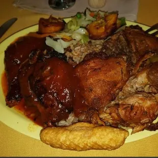 ENJOY THE BROWN STEW/JERK CHICKEN SPICY COMBO MOUTH WATERING. C&apos;MON IN WE&apos;RE OPEN UNTIL 8PM.