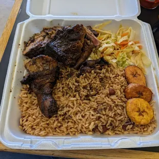 Large jerk chicken. Comes with rice 'n beans, slaw and plantains.