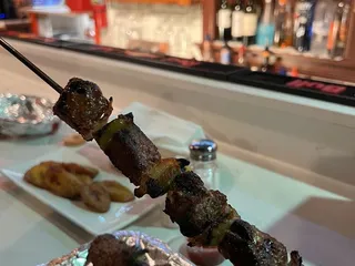 Tam Tam Zings Bar & Grill