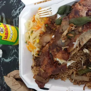 Brown stewed fish rice and  beans cabbage