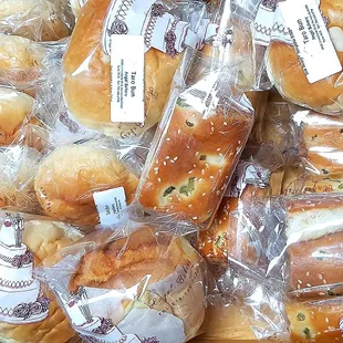 Taro buns are $1.50 and sponge cakes are $2. Not sure about the other item. Taro bun was good but I didn't care for the cake.