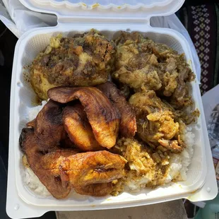 My favorite feel-good meal on the island: Oxtail, fried plantains and coconut rice