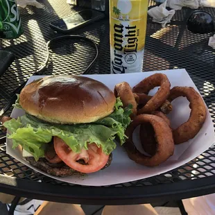 The Caribbean burger with onion rings