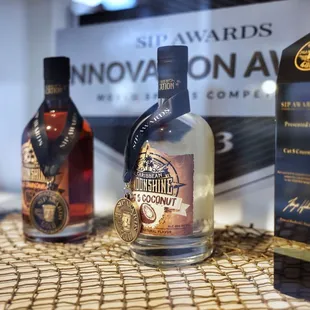 three bottles of rum