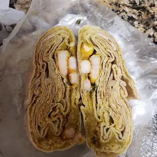 $14 for roti with a light spread of shrimp curry lol. It was not like this in the years past.