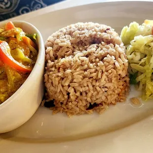 FANTASTIC Curry Tilapia (larger portion than appears in this photo), red beans and rice, ccooked cabbage Tilapia Filet curry