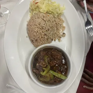 Oxtails, cabbage &amp; rice/peas