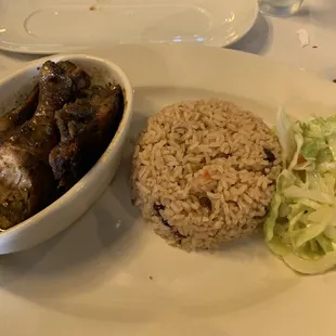 Jerk Chicken with Rice and Peas and cabbage