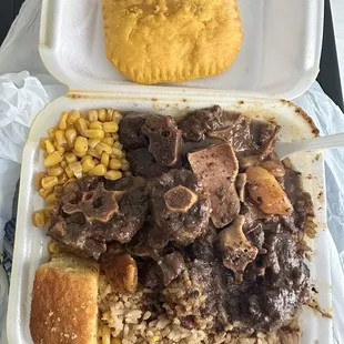 Large oxtail, rice and peas, cornbread and a beef pie