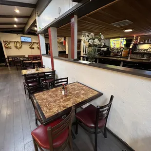 a table and chairs in a restaurant