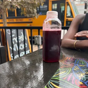 a bottle of juice on a table